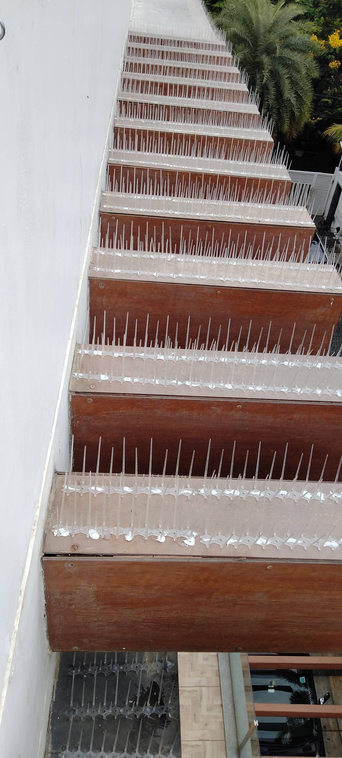 Professional bird spikes installation by Urban Safety Nets, Bird spikes preventing roosting on outdoor units,